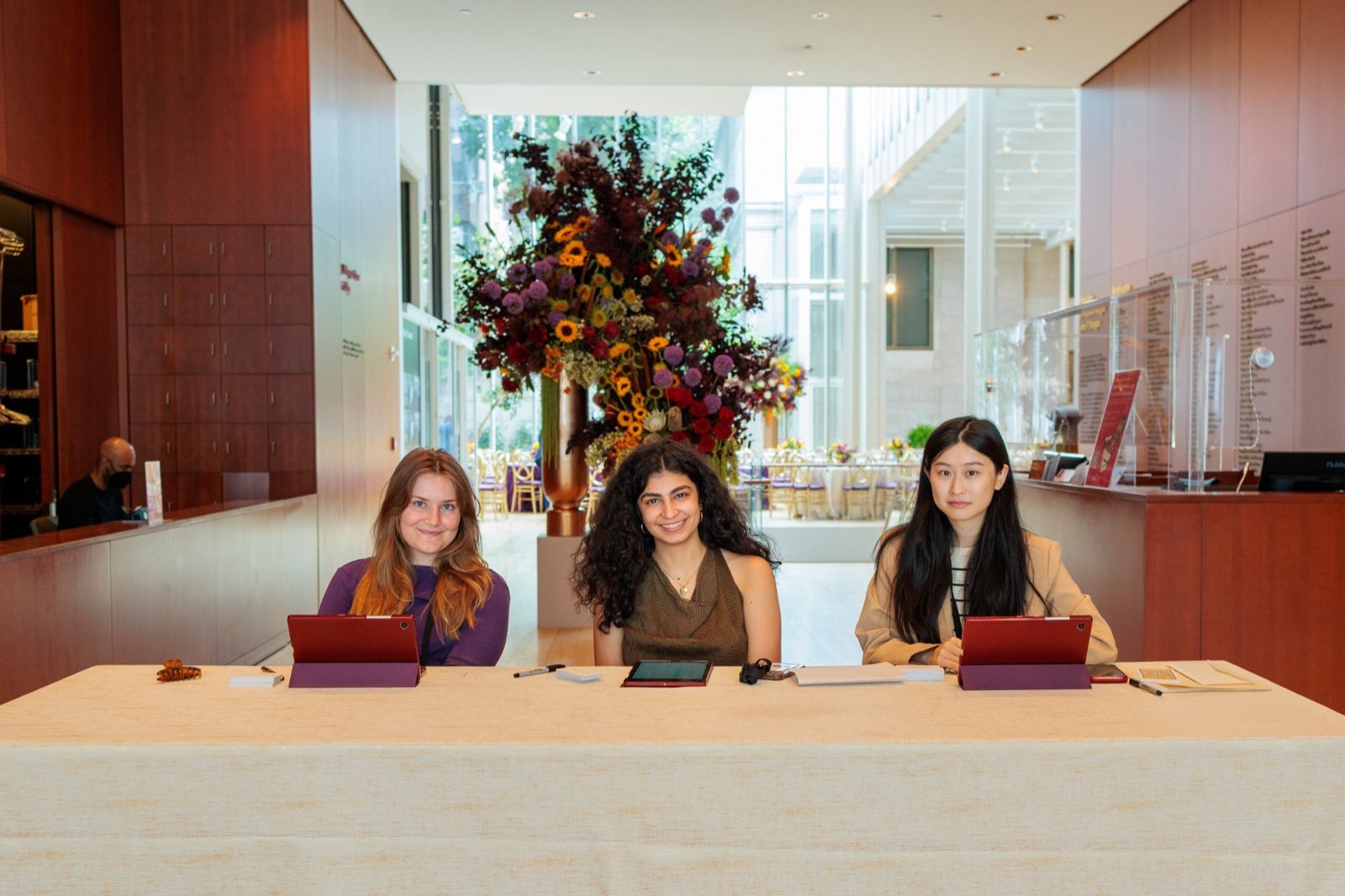Elika and colleagues at the check-in desk